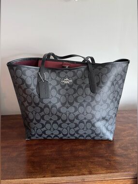 Coach Black Signature Tote with Burgundy Interior Accent